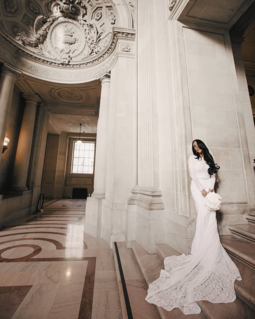 The bride standing at the Mayors Balcony